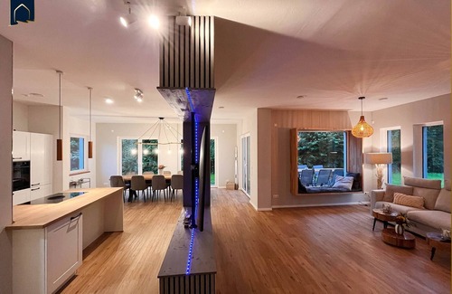 Usedom Casa | Modern natural idyll: Spacious vacation home near the Karnin lift bridge for 10 guests.