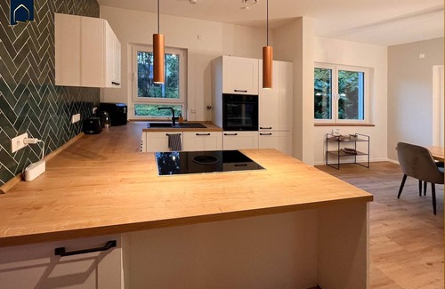 Usedom Casa | Modern natural idyll: Spacious vacation home near the Karnin lift bridge for 10 guests.