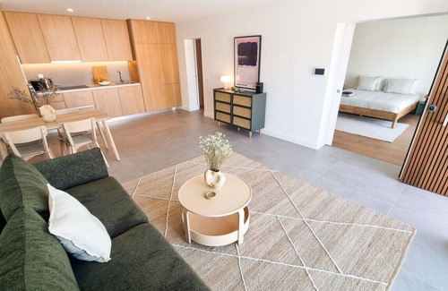 Barril de Cima Apartamento | Modern Oasis with Sunlit Patio in Carvoeira