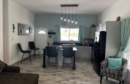 Cockburn Town Casa | Modern ocean villa with heated pool