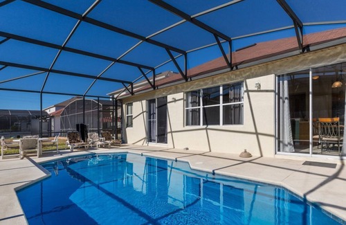 Windwood Bay Casa | Moderna casa de piscina con sala de juegos, 2 en suites y solo 15 minutos de parques temáticos.