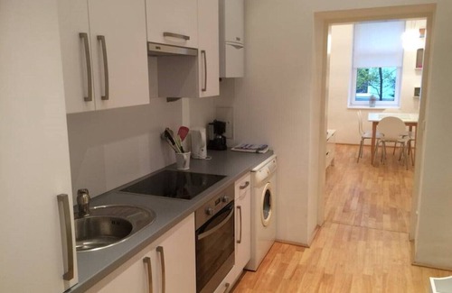 Wahring Apartamento | Apartamento moderno y tranquilo en un edificio antiguo.