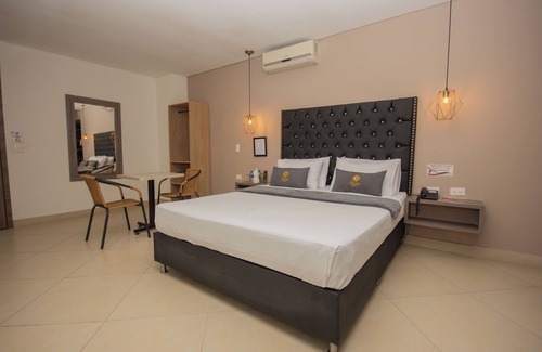Bello Hotel | Habitación Deluxe con bañera hidromasaje en Bello