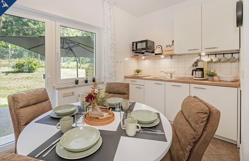 Garz Apartamento | Modern semi-detached house with terrace and garden furniture