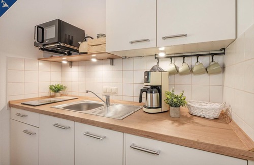Garz Apartamento | Modern semi-detached house with terrace and garden furniture
