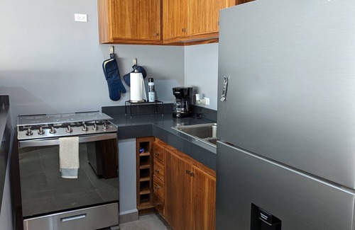 Libertad Condominio | Modern, spacious condo w/ pool. Close to Downtown.