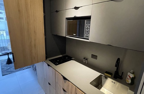 Distrito Financiero Apartamento | Modern studio with parking - Murphy bed