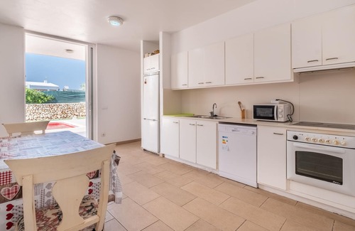 Sant Lluis Villa | Moderna Villa Cap de Font con piscina y terraza en la azotea; aparcamiento disponible, se admiten mascotas