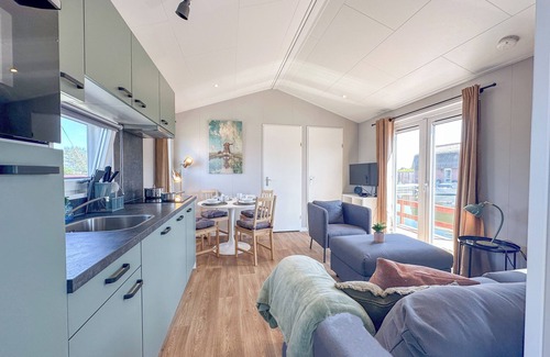 Municipality of Stichtse Vecht Chalet De Esquí | Modern waterfront chalet with airco and terrace