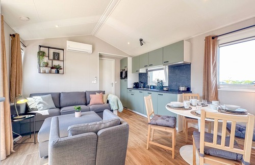 Municipality of Stichtse Vecht Chalet De Esquí | Modern waterfront chalet with airco and terrace