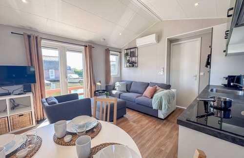 Municipality of Stichtse Vecht Chalet De Esquí | Modern waterfront chalet with airco and terrace
