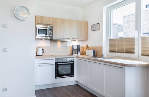 Boltenhagen Apartamento | Modernes, Strandnahes Apartment für Zwei mit Sonnigem Balkon und Blick ins Grüne - Aparthotel