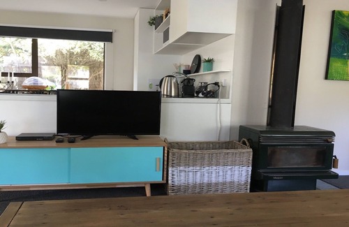Purakaunui Casa | Bach modernizado en la hermosa y aislada Long Beach.