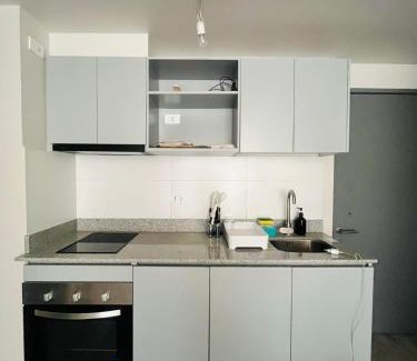 Downtown Santiago Apartamento | Moderno departamento a metros de Movistar Arena