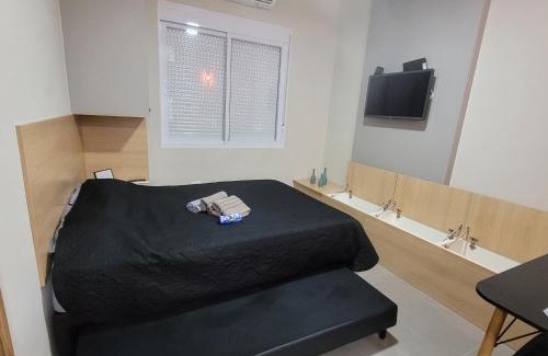 Ponta da Praia Apartamento | Moderno kitnet frente mar - Ponta da Praia, Santos