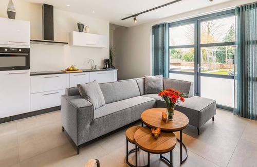 Bunde Casa | Moderna casa de vacaciones en Bunde con una bonita terraza