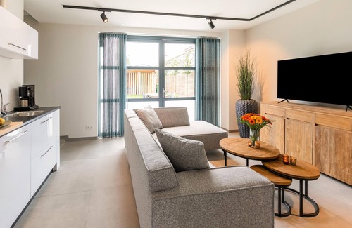 Bunde Casa | Moderna casa de vacaciones en Bunde con una bonita terraza