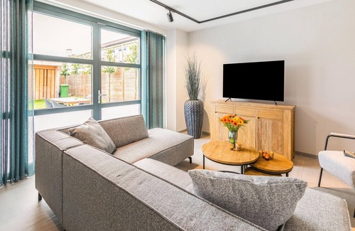 Bunde Casa | Moderna casa de vacaciones en Bunde con una bonita terraza