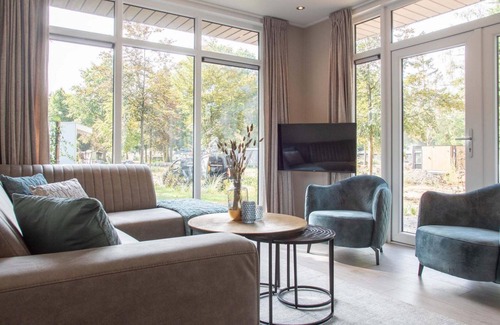 Ede Chalet De Esquí | ✓ Module at Bospark Ede ✓ Holiday home for 4 persons ✓ Located in Ede (Gelderland) ✓ Holiday park on the Veluwe ✓ Book directly through the park