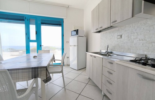 Posto Rosso Casa | MONOLOCALE LA CORTE SUL MARE
