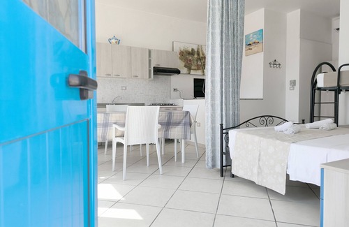 Posto Rosso Casa | MONOLOCALE LA CORTE SUL MARE