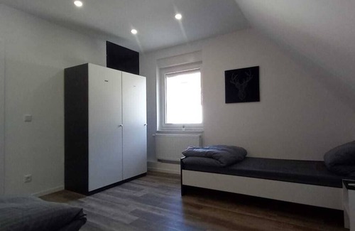 Osnabrueck Apartamento | Monteurzimmer mit Fast Wlan, Einzelbetten, Smart TV je Zimmer, Osnabrück