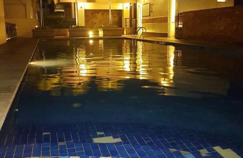 Pinagsama Apartamento | Morgan Suite BGC across5 Venice Canal Mall free Pool gym