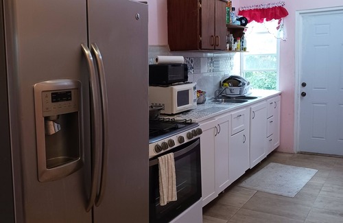Sandy Point Town Casa | Mountain and Sea View Stay