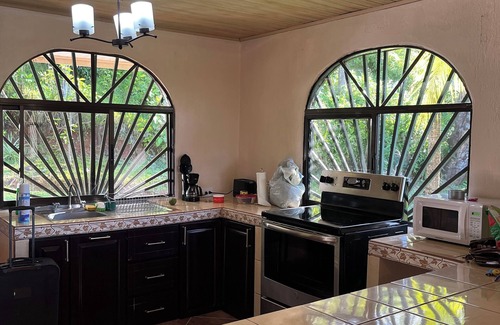 Savegre Cabaña | Mountain Breeze Villa, a charming 2 BR cottage with spectacular views, WIFI, AC