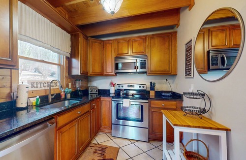 Cherry Log Cabina | Mountain view cabin with game tables, large deck, hot tub, fireplace, & AC