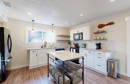 Sylva Casa | Mountain view home with fire-pit with beautiful view of the creek