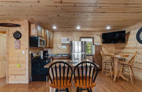 Bryant Casa | Mr Hills Mercantile Cabin with a hot tub