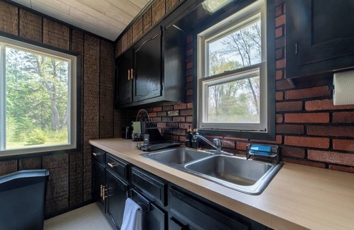 Cheboygan Cabina | Mud Creek Cottage waterfront acre lot & game-room