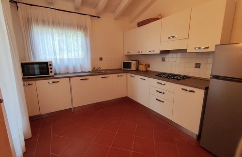 Punta De Su Turrione Villa | Multi-level villa with private garden and pool, sea view and air conditioning.