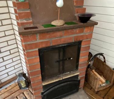 Lockna Casa | Mysig stuga med kamin och gratis båt