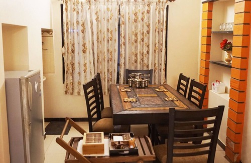 Coimbatore Casa | Nandhanam Eco Home Stay AC con opciones de bicicletas / automóviles