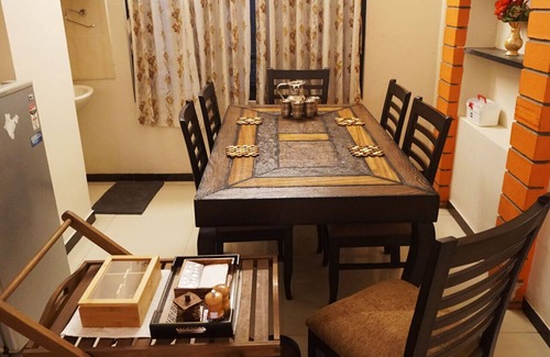 Coimbatore Casa | Nandhanam Eco Home Stay AC con opciones de bicicletas / automóviles