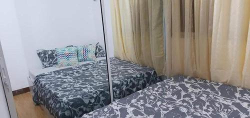 Sasa Apartamento | Near SM Lanang & Samal Wharf - 2BR Condo Davao - Netflix