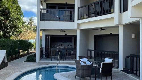 Fitts Village Apartamento | Nestled in the heart of Fitts Village, Zinnia becons with the promise of a costa