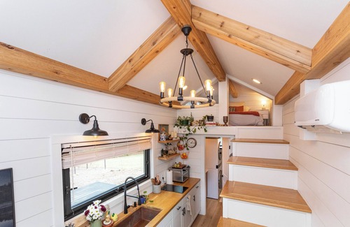 Alexander Casa | Nestled in the mountains, this cozy tiny home is 15 minutes to Asheville.