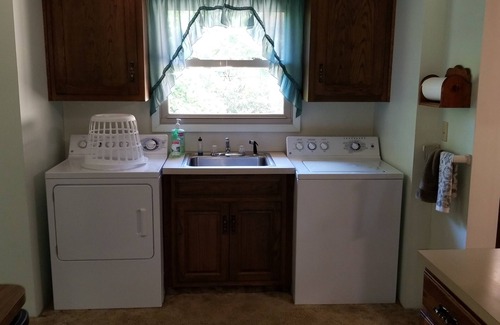 Hillsboro Casa | Nestled near woods and creek, this large home is near state parks and colleges..