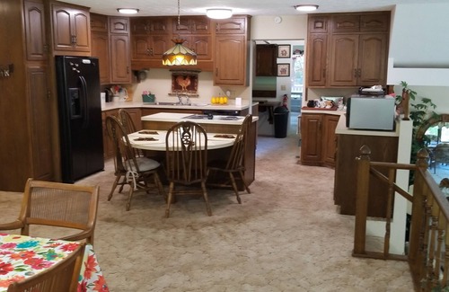 Hillsboro Casa | Nestled near woods and creek, this large home is near state parks and colleges..