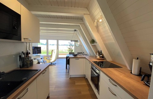 Carolinensiel Casa | Neu Nach Komplettrenovierung: Nurdachhaus Murmel 6 - Ladestation f. E-autos,wlan