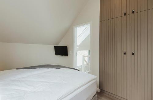 Sagard Casa | NEU "Rügen Resørt Sagard" großzügige, gemütliche Doppelhaushälfte "Bjarne" mit Terrasse