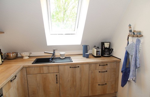 Eilsum Apartamento | Neue 80qm Ferienwohnung für 4 Pers. + 2 Hunde mit Kamin, Balkon & Wasserblick