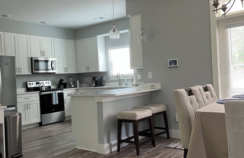 Jarvisburg Casa | New 3-bedroom townhome near OBX beaches with a community pool . Outside lounge
