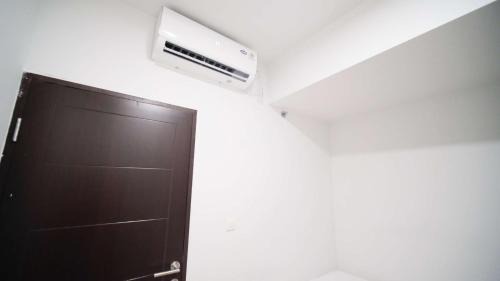 Sidoarjo Apartamento | New and Homey 2BR Apartment at Suncity Residence By Travelio