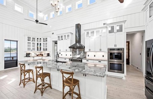 Gulf Shores Casa | New, bayfront custom home with pier for your boat plus outside deck