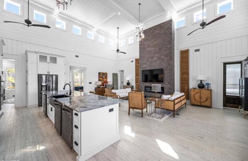 Gulf Shores Casa | New, bayfront custom home with pier for your boat plus outside deck