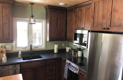 Cheboygan Cabaña | New! Beautiful Mullett Lake three bedroom cottage